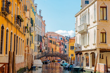 Fototapeta premium canal view with bridge in Venice Italy