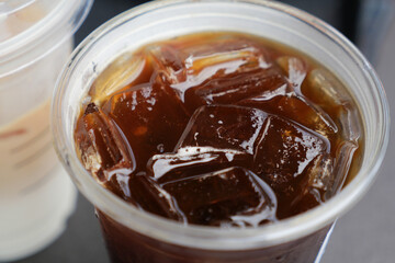 A Refreshing Iced Coffee Served in a Clear Cup for Your Enjoyment