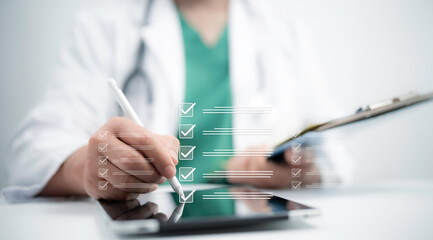 Doctor completes a digital checklist on a tablet, symbolizing accuracy and efficiency in modern...