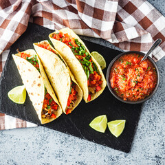 Delicious Spicy Mexican Tacos with Beef, Salsa, and Vegetables, Homemade Street Food, Healthy and Juicy Meal