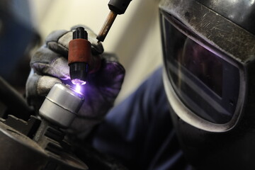 welder man working, welding metal, industrial iron worker