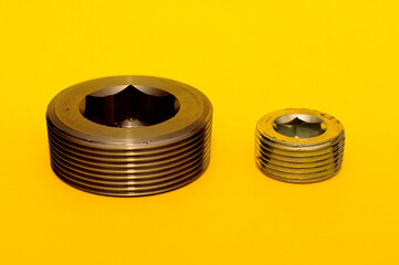 metallic bolt and screw, hardware equipment, closeup on nuts, isolated background