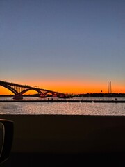 Bridge in Buffalo connecting to the Canadian border at sunset.