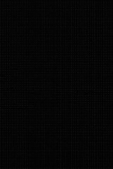 Fototapeta premium a close up of a black background with a small white dot