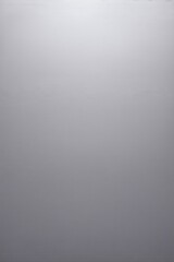 there is a small boat floating in the water on a foggy day