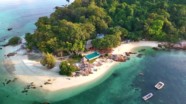 Discover the tranquil shores and lush surroundings of Koh Munnork Island. Engage in swimming, sunbathing, and exploring pristine nature on this idyllic getaway in Thailand.