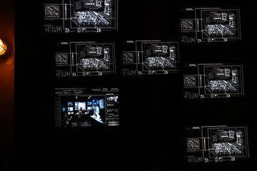 Digital Computer Screens With Surveillance CCTV Video in A Monitoring Center