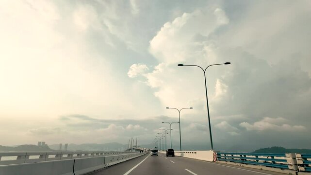 Dashboard view while driving on Penang's Second Bridge, also known as Sultan Abdul Halim Muadzam Shah Bridge..