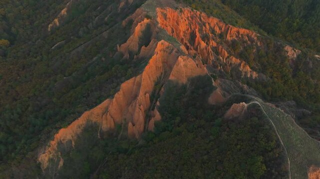 Golden Hues from Above: Aerial Cinematic Shots of the Stob Pyramids in Bulgaria.
Cinematic drone views highlighting the textures and orange tones at sunset.