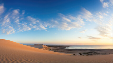 Panoramic Sunset View Over Desert Dunes and Ocean
