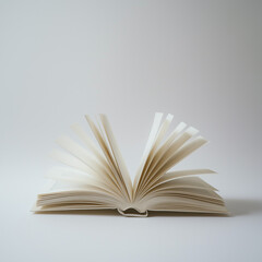 Fototapeta premium A open book with a completely white background 