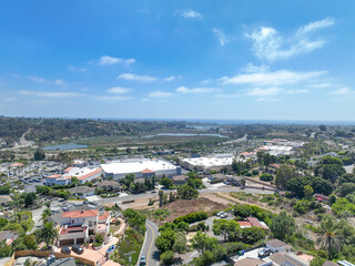 Aerial view of middle class houses in the valley of Oceanside town in San Diego, California. USA.