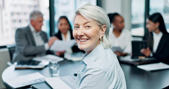 Business people, office and face of mature woman in meeting, planning and discussion with team. Professional, boardroom and portrait of person with documents for proposal, company review and planning