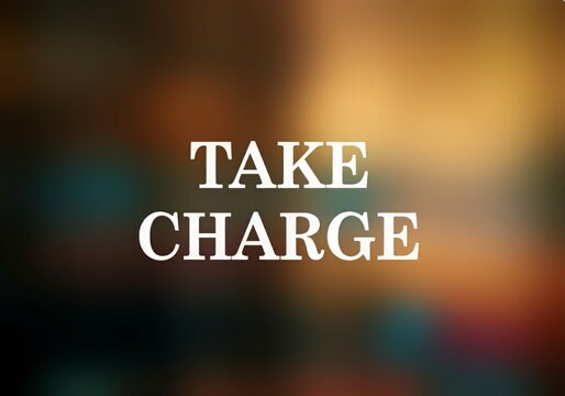 Take Charge wording on blurred background