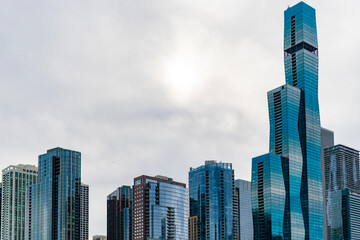 Business skyscraper of glass. Skyscraper in city. City downtown with skyscraper. Office building business district. Modern glass building. Chicago city, copy space. Skyscraper building architecture