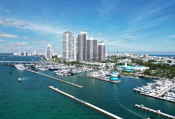 Fototapeta premium Luxury yacht. Miami south beach view. Yacht club. Marina in Miami, Florida. Biscayne bay. Downtown Miami marina with luxury yacht. Summer vacation. Luxury South beach marina. Waterfront views