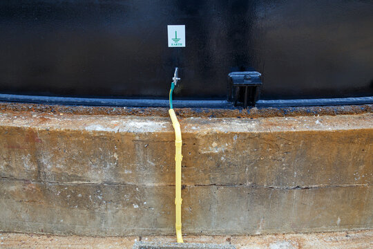 Ground wires on the oil storage tanks are installed to prevent accidental lightning strikes into the tanks.