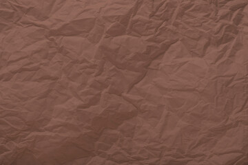 Mocha Mousse paper wrinkled texture for background and copy-space. Color of the Year 2025