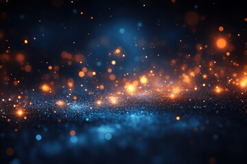 Fototapeta premium Glittering blue and orange bokeh lights on dark background.