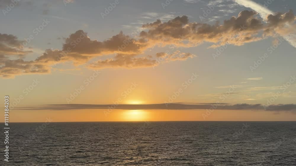 Sticker Dusk sky clouds over calm sea at evening.