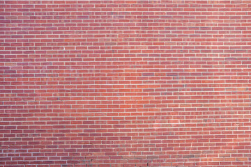 Background from a large wall made of red bricks