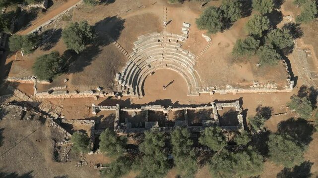 Tourists Walk Around Ancient Outdoor Theater Of Aptera On Greek Island Of Crete 4K 60FPS