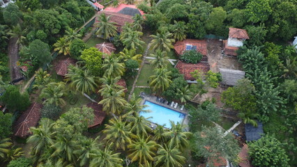 Dron Shot of Jungle, Ocean and Pool