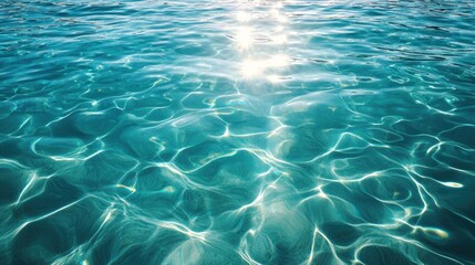 Obraz premium Crystal clear lake water with sunlight reflecting off the surface, showing ripples and distant shores.