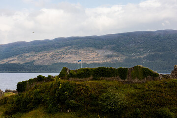 Scottish Flag on Ruins of Urquhart Castle - Loch Ness, Scotland