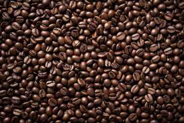 Fototapeta premium a close up of a pile of coffee beans with a brown background