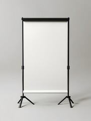 A blank white backdrop on a black stand