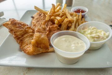 Fish and chip meal at restaurant ready to eat
