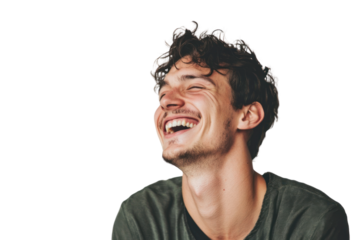 Joyful Laughter: A young man with curly hair bursts into genuine laughter, his eyes closed and mouth wide open. The candid shot captures the pure joy and infectious energy of his laughter.