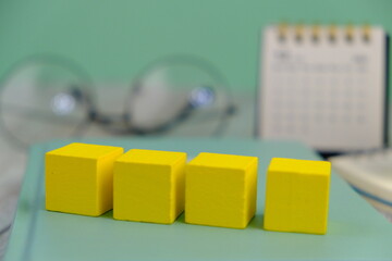 Wooden block, alarm clock with no word as a template for text space concept. business concept