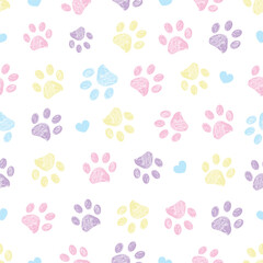 Lilac pink blue yellow doodle paw prints and hearts seamless fabric design pattern