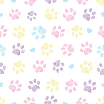 Lilac pink blue yellow doodle paw prints and hearts seamless fabric design pattern
