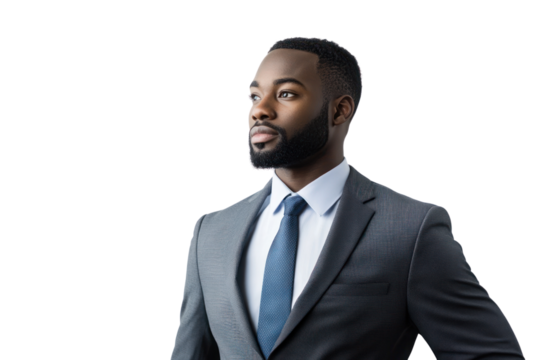 Visionary Leader: A confident businessman in a sharp grey suit looks off to the side, his gaze filled with determination and ambition. The image conveys a sense of leadership, strategy.