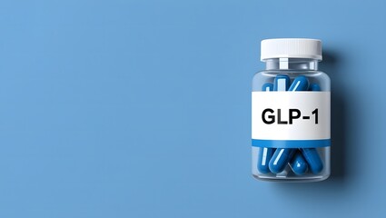A medicine bottle labeled glp-1 placed against a blue background, medical research, pharmaceutical development, healthcare concept