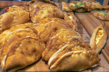 dietary vegan products from puff pastry sprinkled with sesame seeds