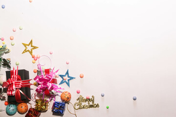 Season's greetings scene. Christmas decorations,gift boxes with red ribbons, сhristmas balls, ...