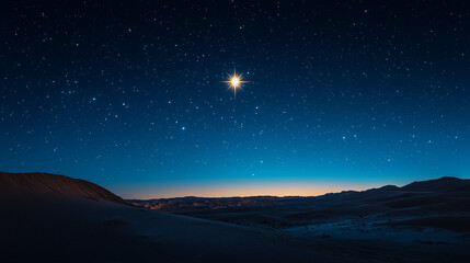 Bright star shining in the twilight sky over a sandy desert landscape