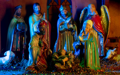 Christmas christian nativity scene. Christmas Manger scene with figures of Jesus, Mary, Joseph,...