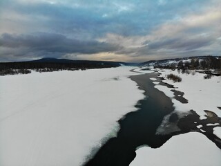 Icy River in Winter Season