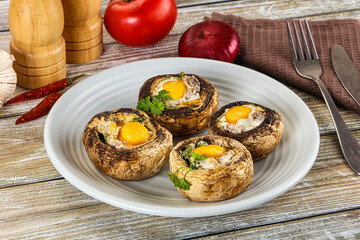 Baked champignon with quail egg