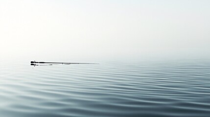Solitary fishing rod on calm, misty water; serene, peaceful scene. Generative ai