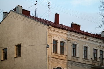 Side part of the facade of an old house