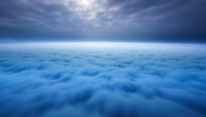 a view of a cloudy sky with a sun shining through the clouds