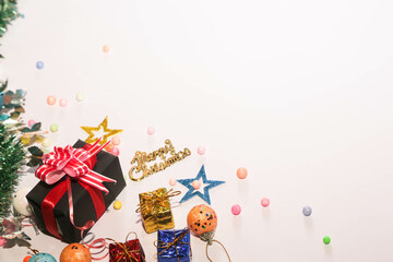 Season's greetings scene. Christmas decorations,gift boxes with red ribbons, сhristmas balls, ...