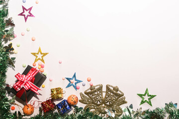 Season's greetings scene. Christmas decorations,gift boxes with red ribbons, сhristmas balls, ...