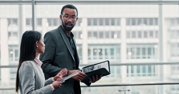 Business, people and walking with documents in office for financial briefing, bookkeeping review or advice. Accounting team, employees or discussion on client account, invoice information or feedback